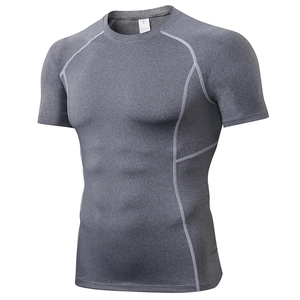 Men's compression training shirt in dark grey with pro quick-dry elastic fabric