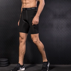 Men's black compression gym shorts with elastic waistband and high-performance quick-dry fabric
