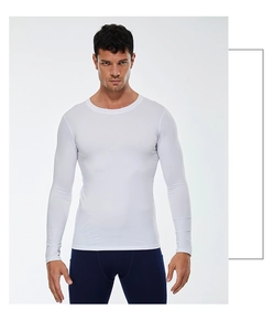 Detail of white men's compression long sleeve shirt showing premium stretch fabric and stitching