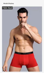 Red men's athletic boxer briefs with a wide black logo waistband and high-stretch fabric