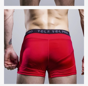 Rear view of red men's athletic boxer briefs with elastic waistband and ergonomic fit