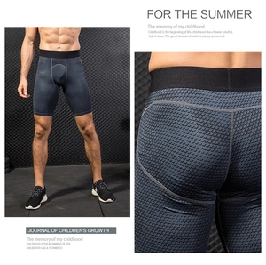 Close-up of men's compression shorts featuring 3D honeycomb texture and ergonomic seams