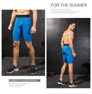 Detail view of blue 3D honeycomb pattern men's compression shorts for gym training