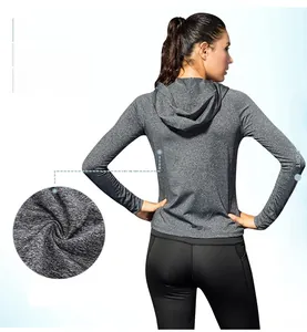 Close-up of gray heathered fabric texture and slim fit back design of women yoga hoodie
