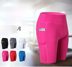 Detail view of high-waist yoga shorts with side pocket and breathable mesh fabric