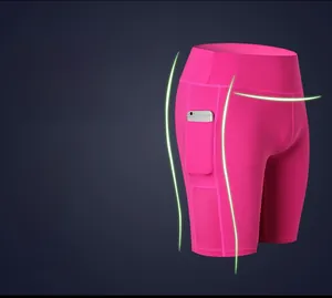 Macro detail of high-waist yoga shorts showing side pocket with mesh panel design