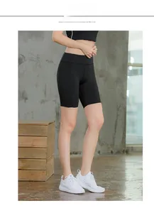 Side view of high-waisted black yoga shorts showing the athletic fit and breathable fabric
