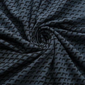 Vue macro du tissu à séchage rapide gris-bleu avec motif chevron 3D pour le fitness masculin