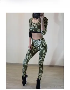 Detail view of two-piece camouflage yoga set with long sleeve crop top and high waist leggings