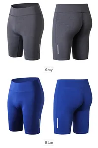 Close-up of high-waisted yoga shorts with reflective side strips in grey and blue