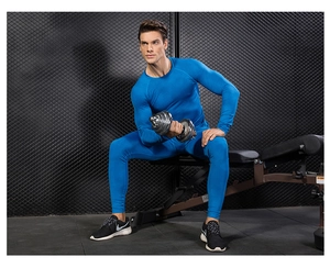 Detail of blue compression suit with 3D honeycomb texture for gym training and running