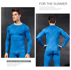 Detail showing the 3D honeycomb weave texture on blue compression sports suit fabric
