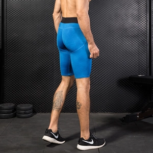 Men's blue 3D honeycomb textured compression shorts with wide elastic waistband