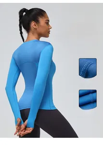 Detail view of women's sports long sleeve with mesh splicing and thumb holes