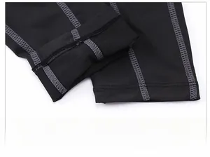 Close-up of flatlock stitching on hem for durable and flexible athletic pants