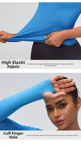 Detail of high-stretch fabric and thumbhole cuffs on light blue athletic long sleeve top
