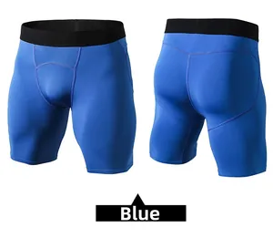 Dettaglio ravvicinato dei pantaloncini a compressione blu uomo con elastico in vita