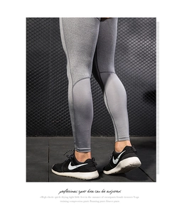 Detail of men's PRO sports tights with breathable mesh stitching and high elastic fabric