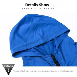 Detail of royal blue hooded sports jacket with windproof collar and black zipper