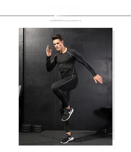 Men's compression suit with long sleeve top and leggings featuring gray contour stitching
