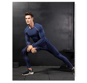 Men's navy blue compression set with flatlock seams for gym training and running