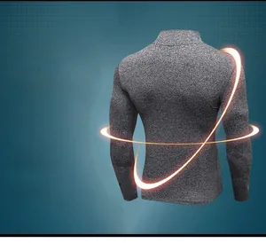Close-up of men's gray long-sleeve athletic top featuring 3D ergonomic slim fit tailoring