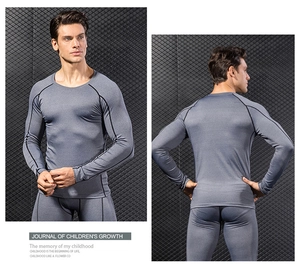 Front and back view of men's PRO compression long sleeve gym shirt in charcoal grey