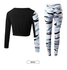 Flat lay of camo yoga leggings and matching long sleeve fitness set in white and blue