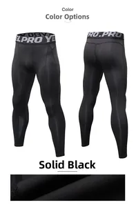 Close-up of black men's pro compression pants showing high elastic waist and fabric texture