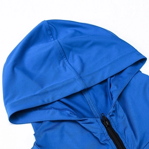 Detail of blue athletic hoodie hood stitching and durable black zipper hardware
