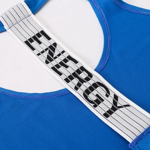 Detail of blue breathable mesh yoga top featuring white straps with black ENERGY text
