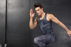 Detail shot of men's compression vest with 3D honeycomb texture and grey print