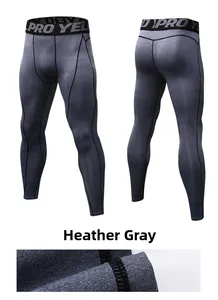 Detail view of heather gray compression leggings with a wide pro elastic waistband