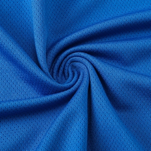 Close-up of royal blue breathable mesh fabric for women's quick-dry sports yoga top