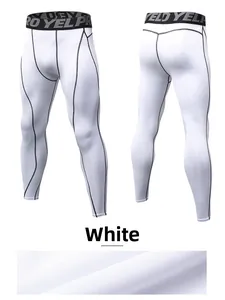 Detailed view of men's pro compression pants with white fabric and black contrast stitching