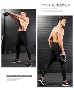 Detail view of men's two-in-one sports leggings and quick-dry shorts for gym training