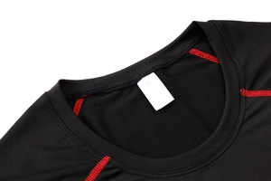 Macro shot of men's PRO compression shirt neckline with red flatlock stitching