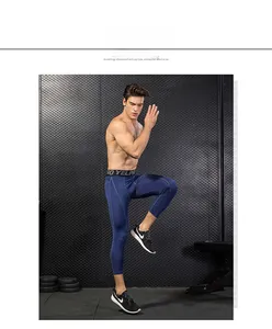 Close-up of high-elasticity breathable fabric on men's athletic compression gym leggings
