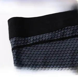 Detail view of high-elastic wide waistband and tight sewing on men's pro compression pants