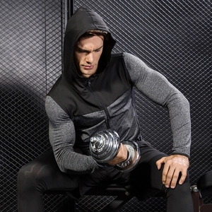 Men's slim fit hooded sports jacket for running and gym workouts in color block design