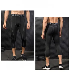 Detailed view of men's compression sports leggings with quick-dry fabric and elastic waist