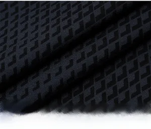 Detailed close-up of quick-dry fabric with 3D geometric V-pattern for men's sports vest