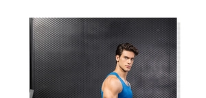 Close-up of royal blue breathable mesh fabric and slim fit design on men's sport vest