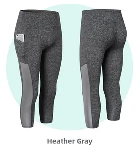 Détail du corsaire de yoga gris chiné avec poches latérales et empiècements en mesh