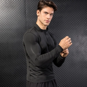 Men's athletic half-zip sweatshirt in black stretch dry-fit fabric for gym and running