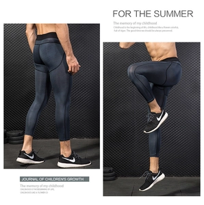Detail of men's compression pants with honeycomb pattern and ergonomic seams for gym training