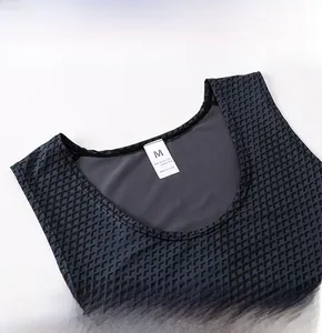 Detailed close-up of men's athletic vest collar with breathable mesh texture and size label