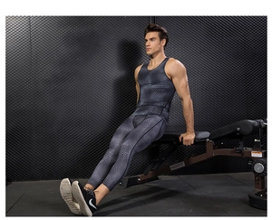 Detail view of men's PRO compression set with grey snake pattern for gym training