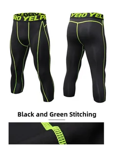 Detail of men's compression shorts with neon green stitching and elastic pro waistband