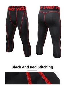 Detail view of compression sports pants featuring breathable fabric and red stitching